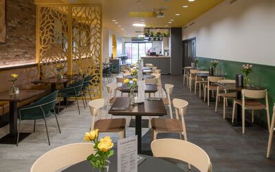 Dining area with comfortable seating perfect for co-working at The Wesley Euston.