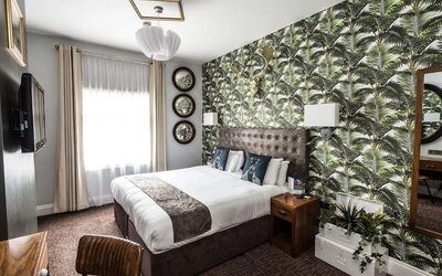 Day use room with TV and work desk at Mercure Nottingham City Centre Hotel.