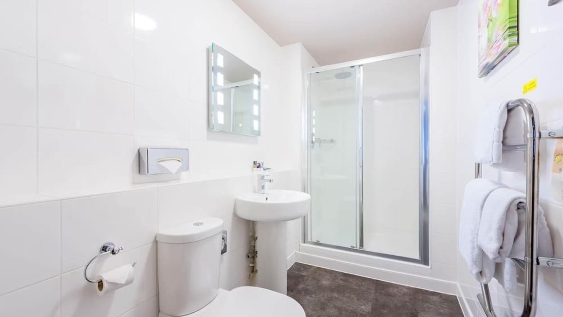 Guest bathroom with shower and free toiletries at Mercure Nottingham City Centre Hotel.