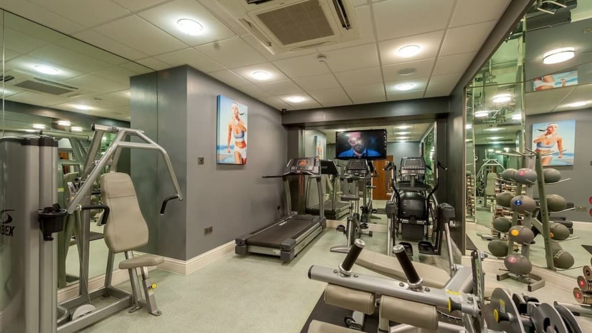 Fully equipped fitness center at Mercure Nottingham City Centre Hotel.