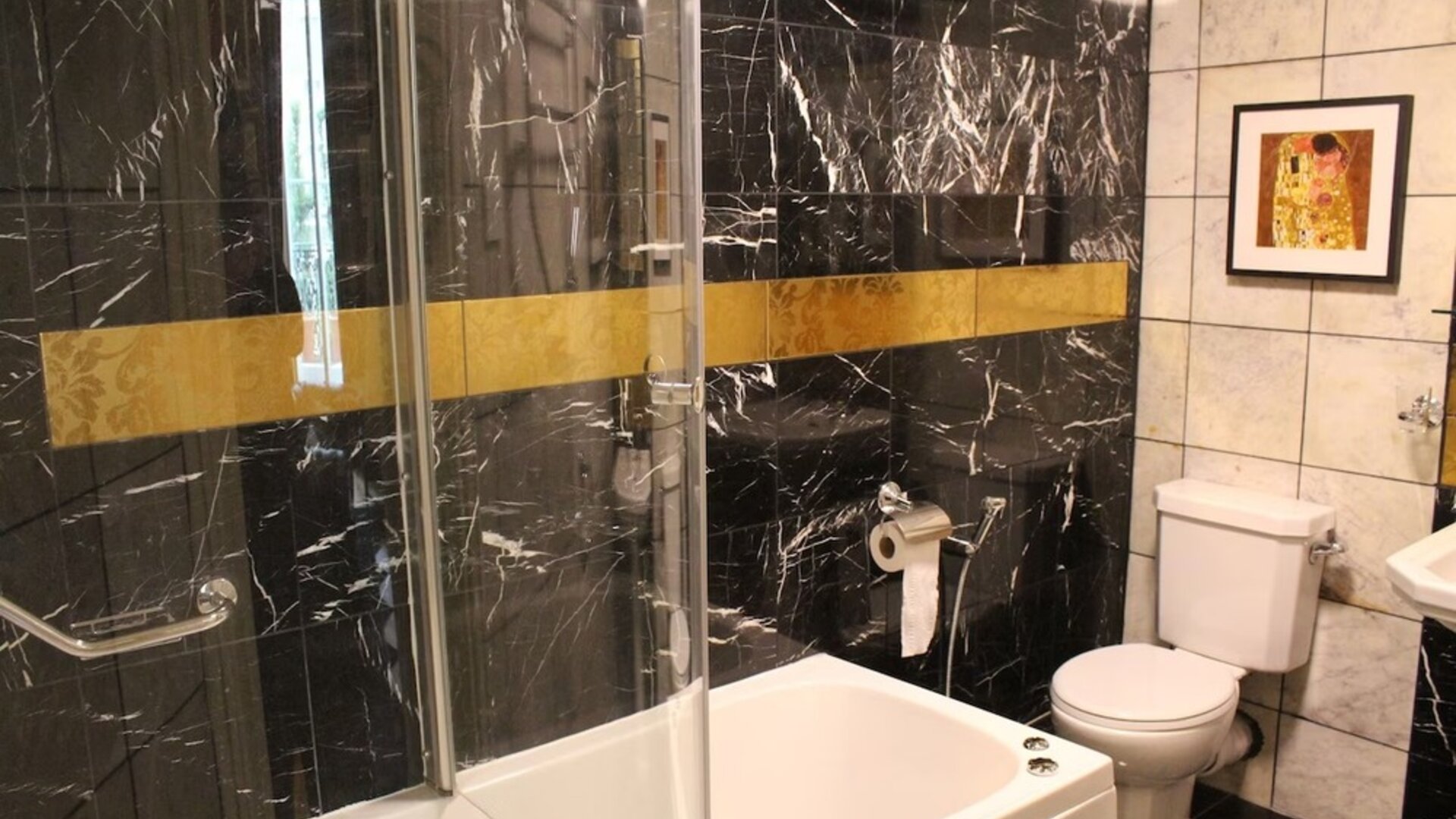 Guest bathroom at Opulence Central London Hotel.