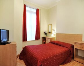 Bright and spacious day use room at Elmwood Hotel.