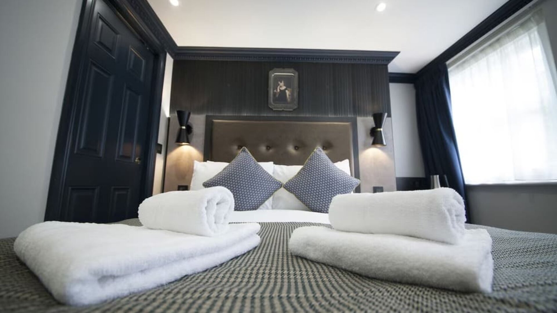 King bed at The House Of Toby Hotel.