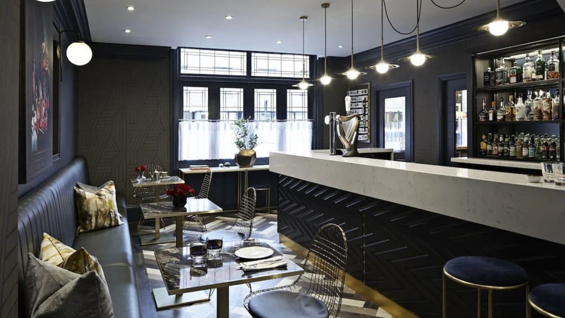 Hotel bar with lounge seating at The House Of Toby Hotel.