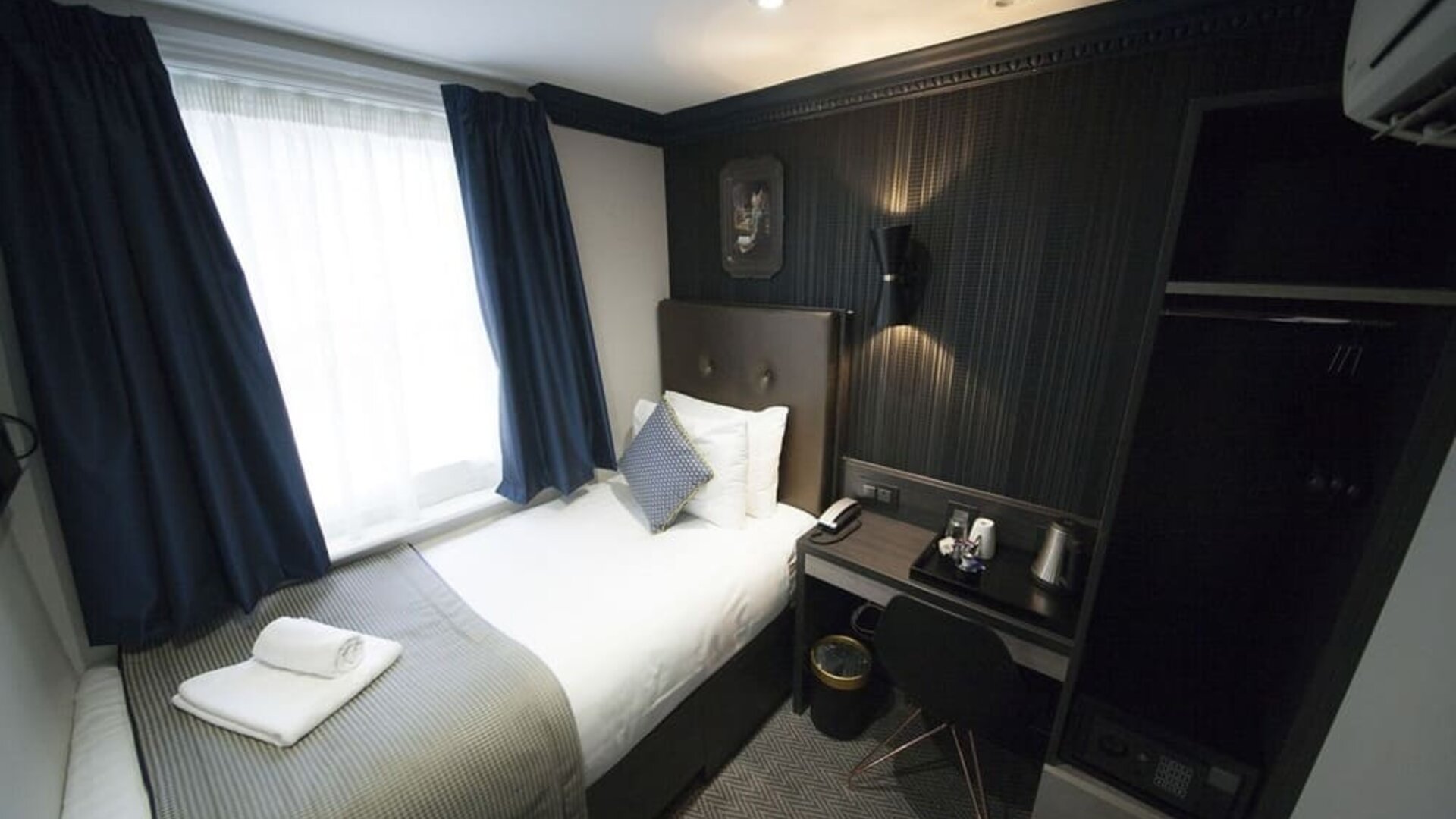 Day use single room with work desk at The House Of Toby Hotel.