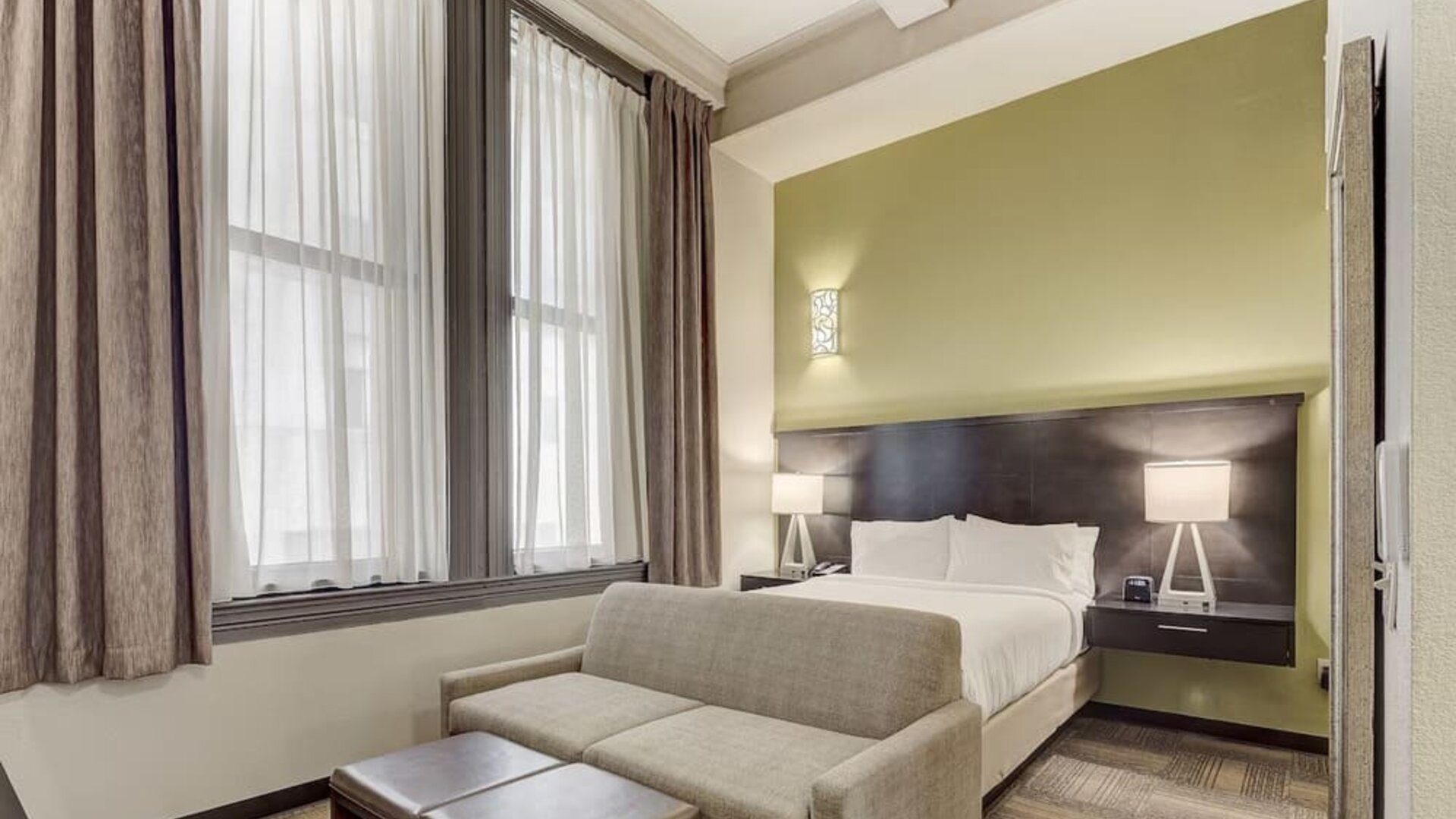 Day use room with sofa at Staybridge Suites Baltimore - Inner Harbor.