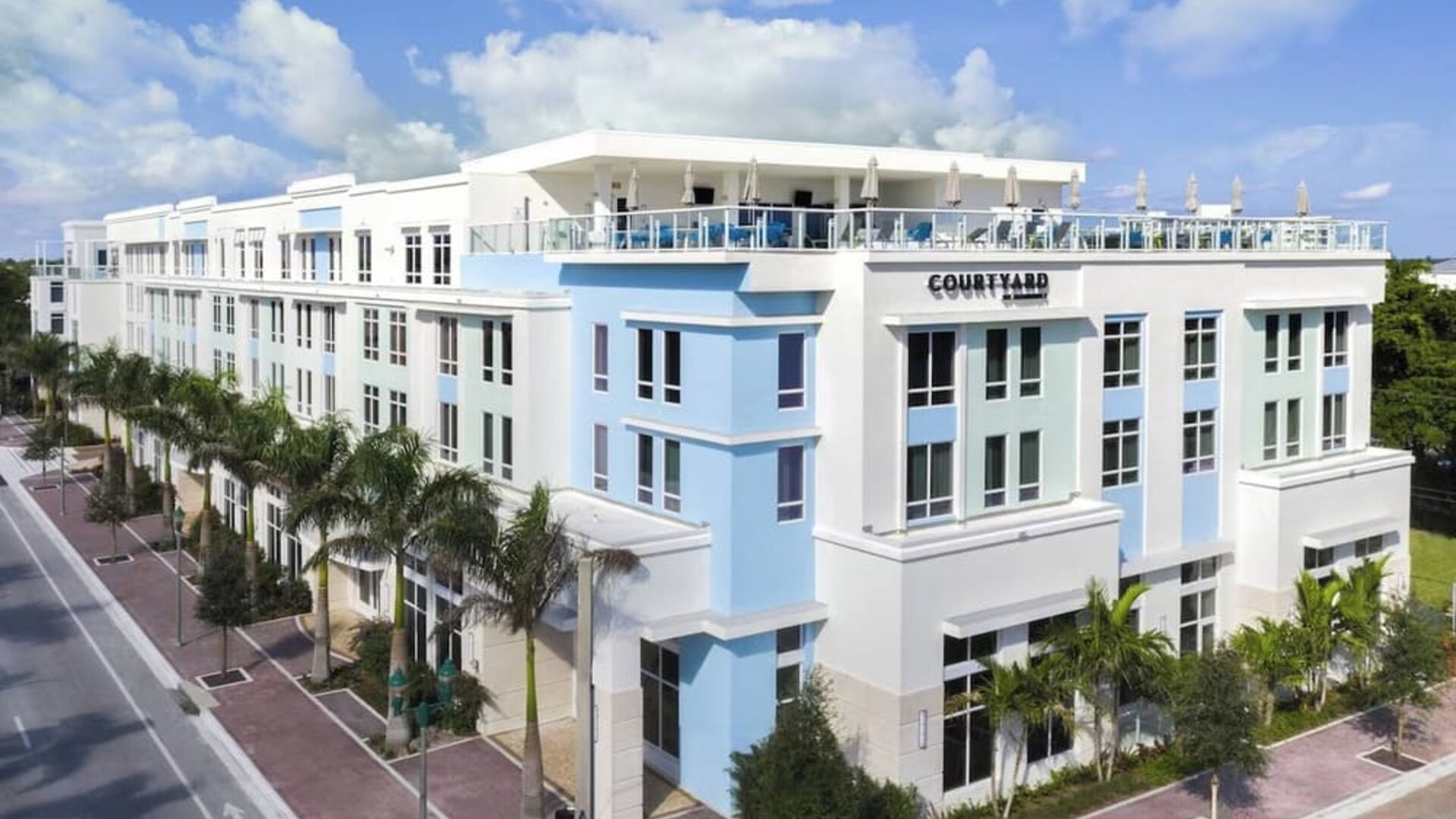 Hotel exterior at Courtyard Delray Beach.
