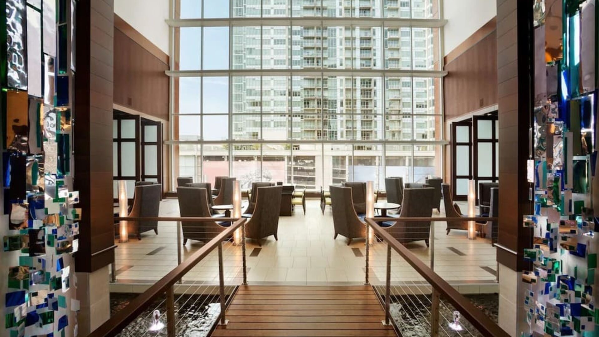 Lobby and coworking lounge at Embassy Suites By Hilton Denver Downtown Convention Center.