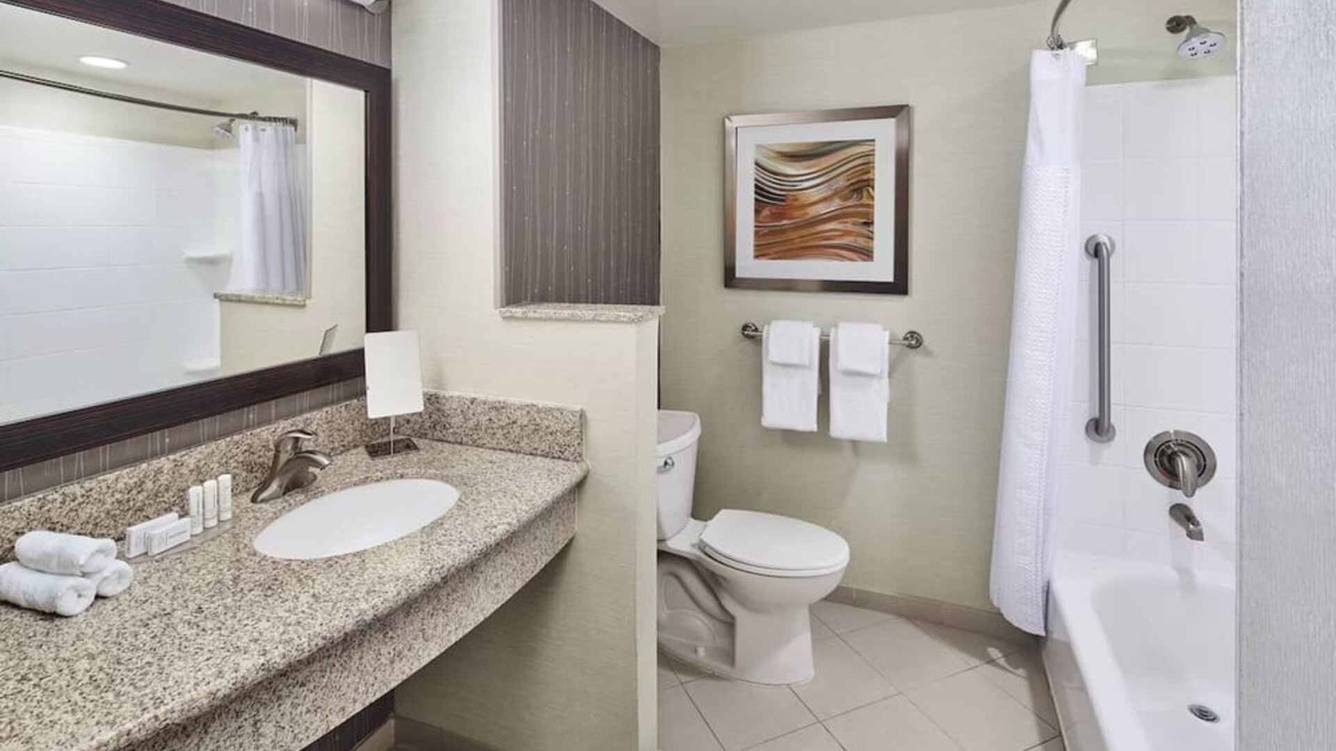 Guest bathroom with shower at Courtyard Bossier City.