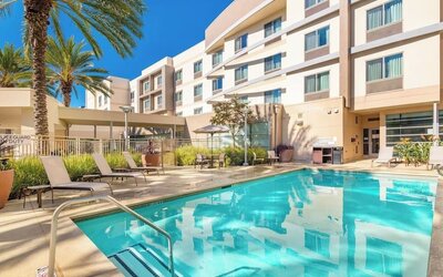 Refreshing outdoor pool at Courtyard By Marriott Santa Ana Orange County.
