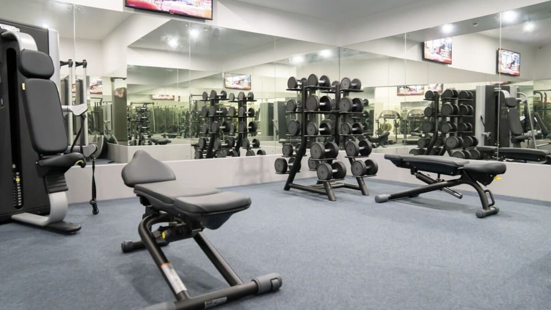 Fully equipped fitness center at Atrium Hotel Heathrow.