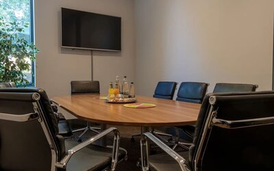 Professional meeting room at London City Airport Hotel.