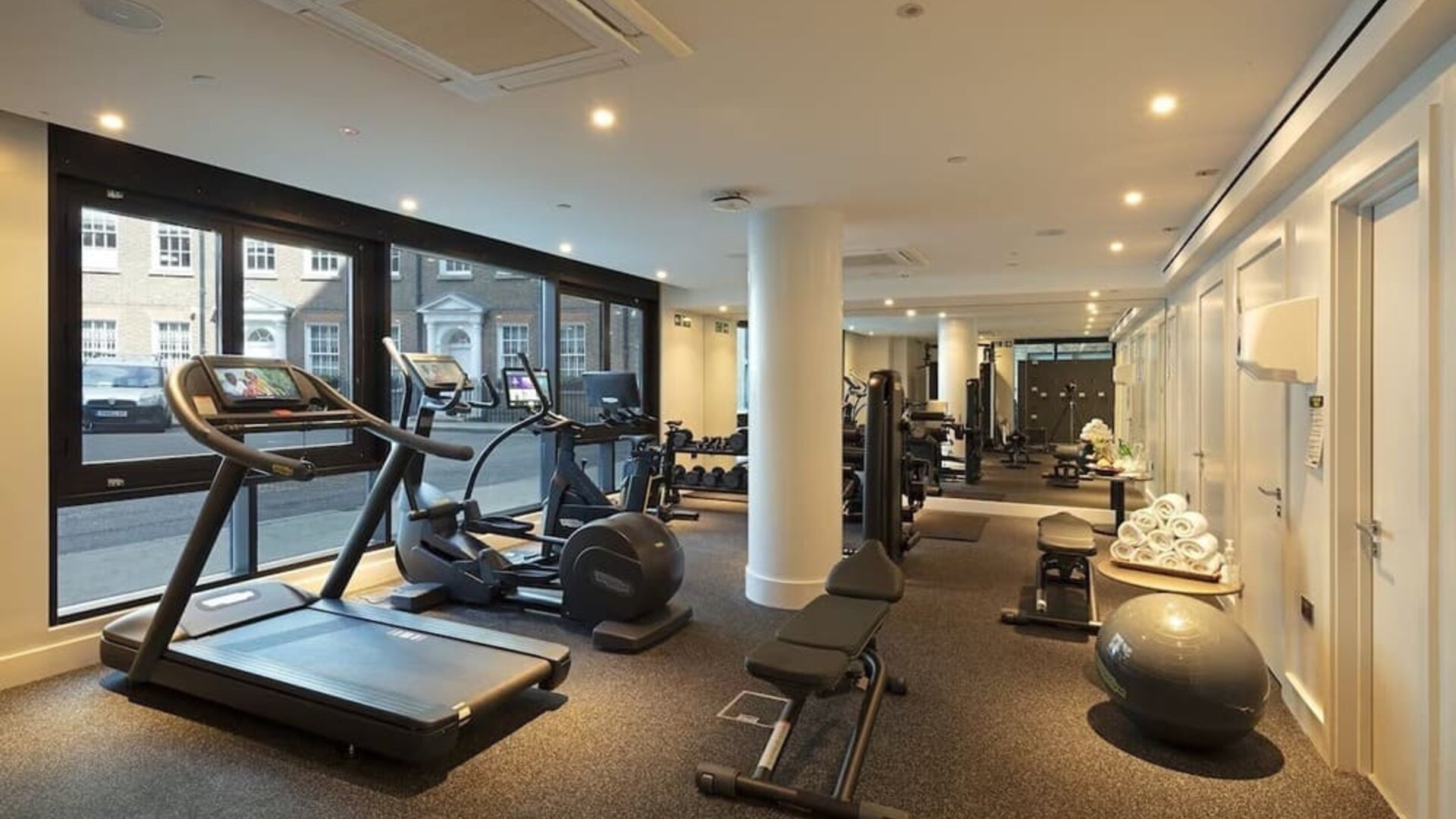 Fully equipped fitness center at Tower Suites Hotel by Blue Orchid.