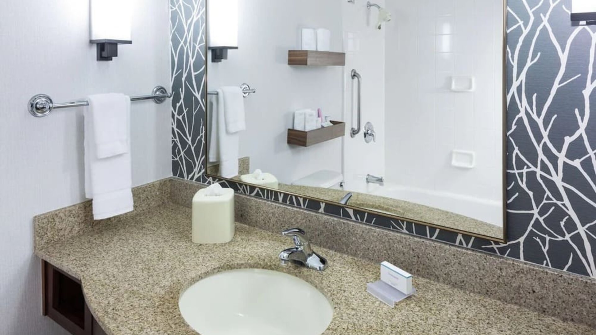 Guest bathroom with shower and tub at Hilton Garden Inn Sacramento/South Natomas.