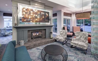 Lobby and coworking lounge at Hilton Garden Inn Sacramento/South Natomas.