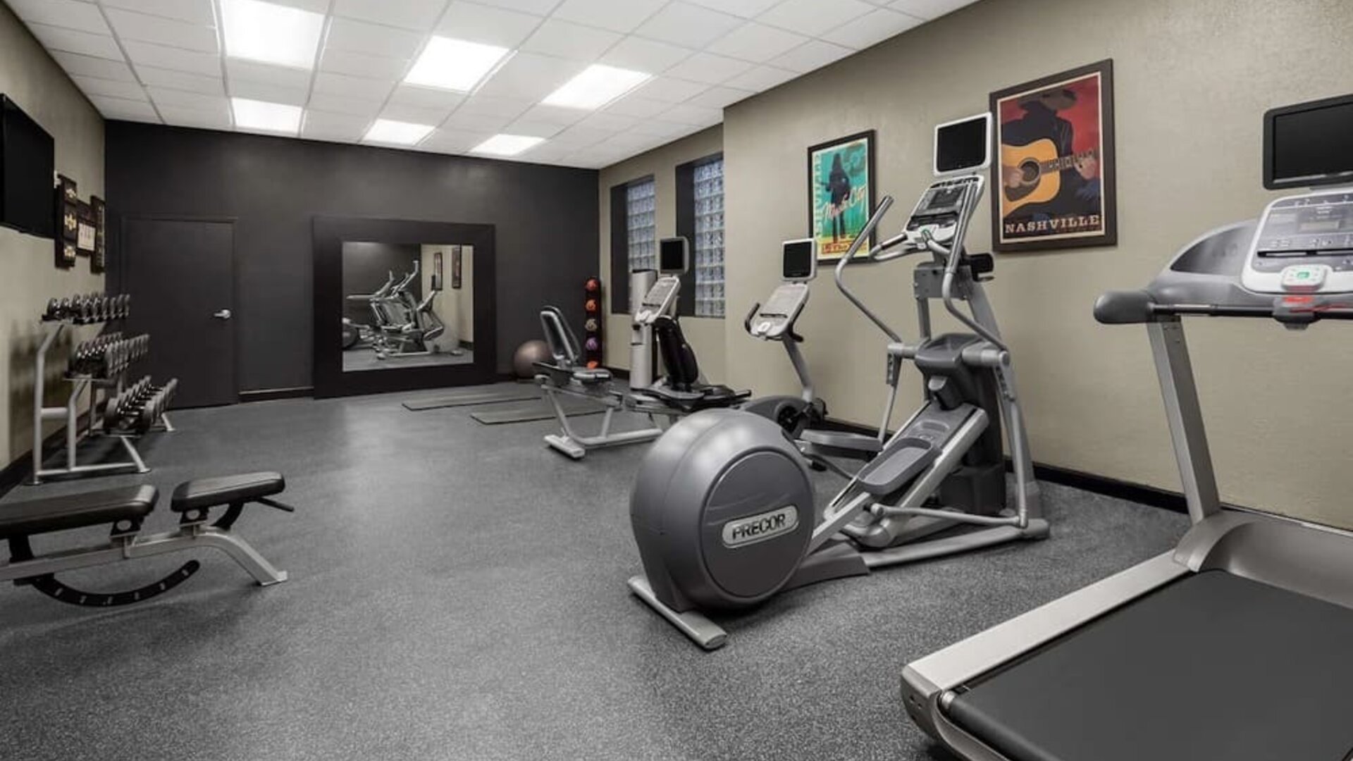 Fitness center at Homewood Suites By Hilton Nashville.