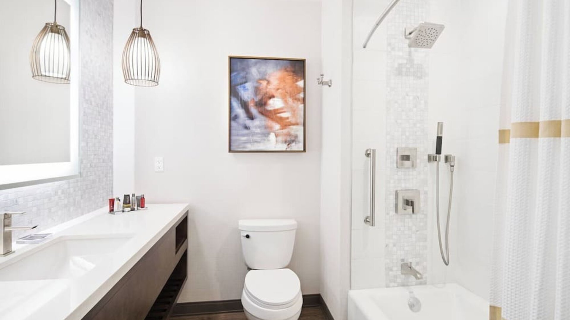 Guest bathroom with shower and tub at Marriott Del Mar.