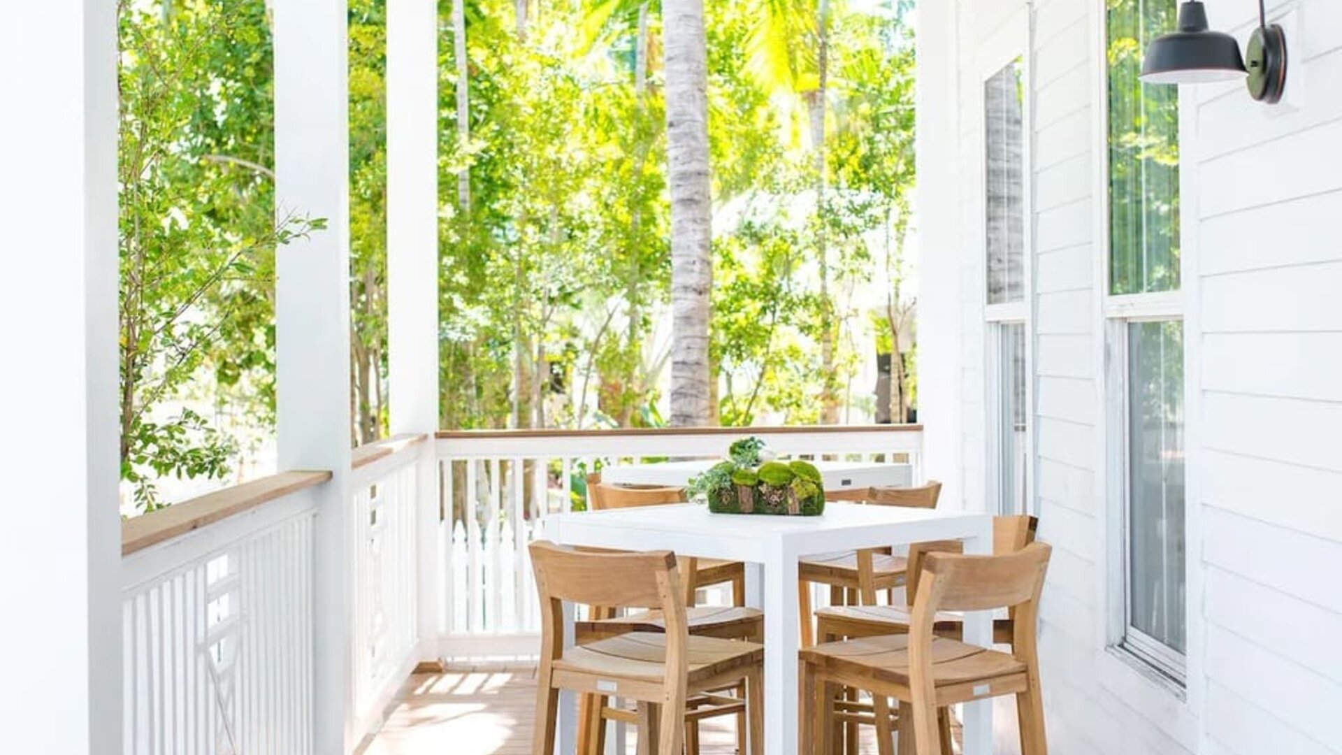 Bar chairs and tables at Parrot Key Hotel & Villas.