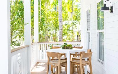 Bar chairs and tables at Parrot Key Hotel & Villas.