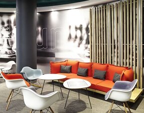 Lobby lounge with comfortable seating, perfect for co-working at Hotel IBIS Birmingham Airport.