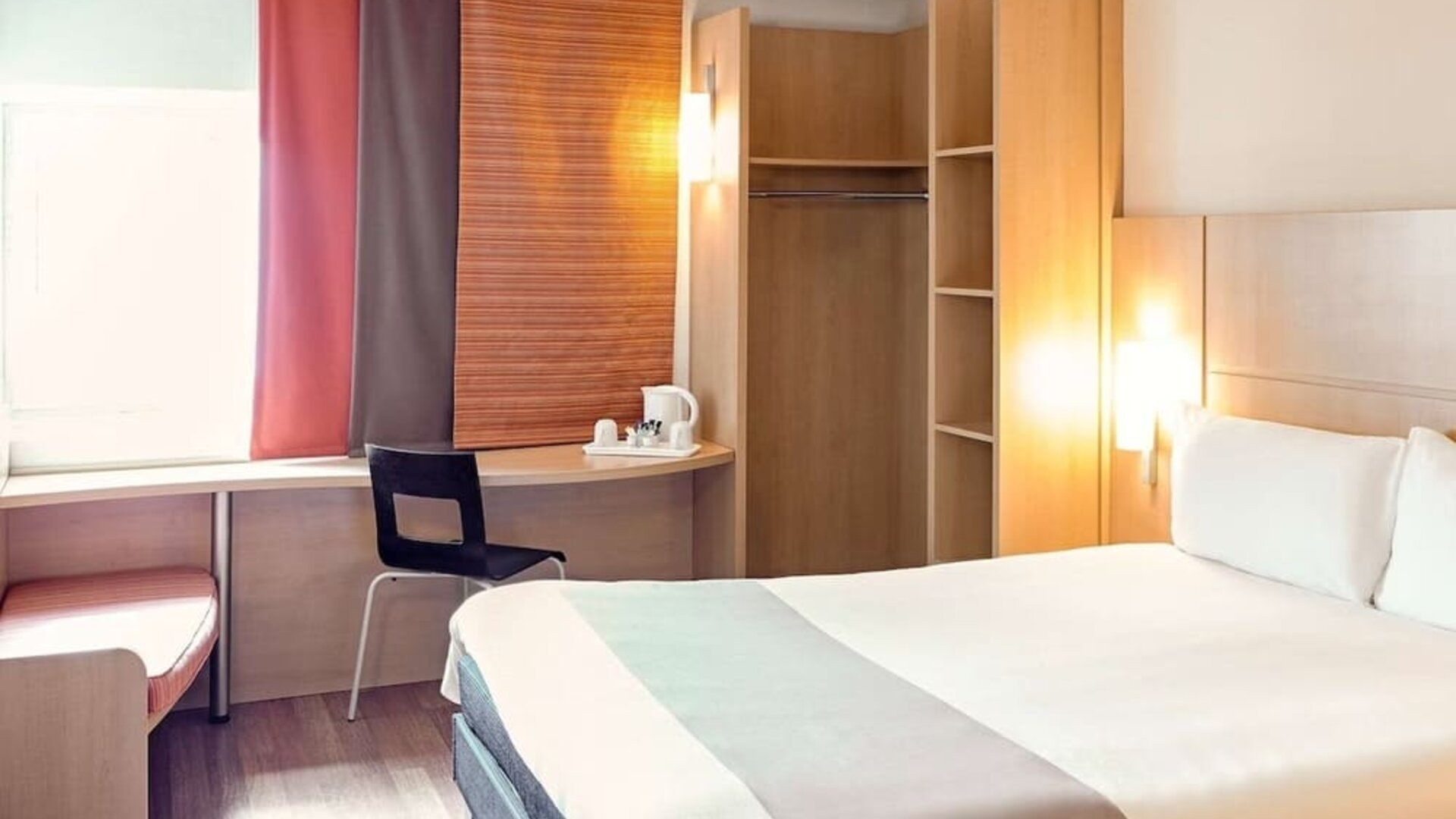 Bright and spacious day use room with work desk at Hotel IBIS Birmingham Airport.