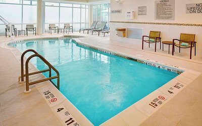Refreshing indoor pool at Springhill Suites Carle Place.