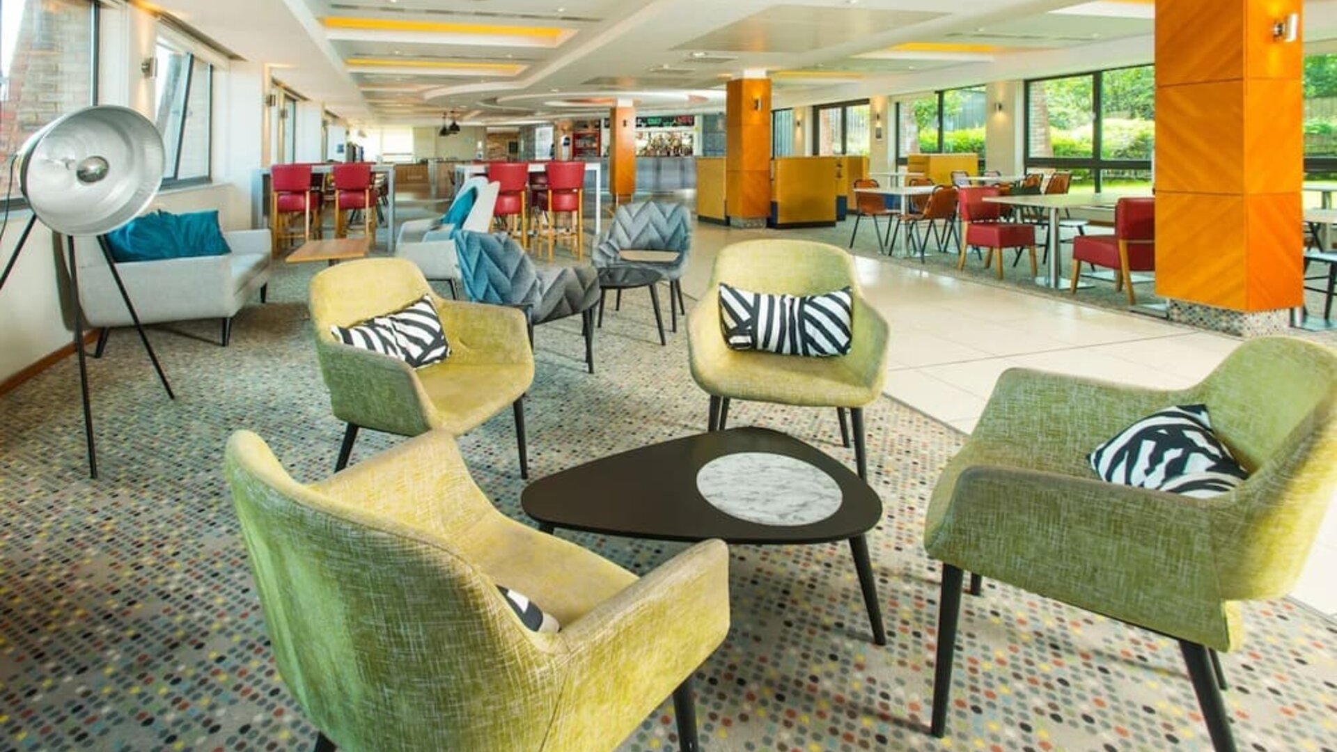 Comfortable lobby lounge at ibis Styles Birmingham NEC.