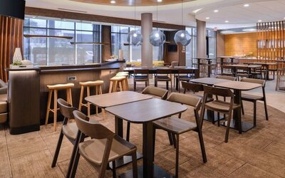 Dining area perfect for coworking at SpringHill Suites By Marriott Irvine John Wayne Airport/Orange County.