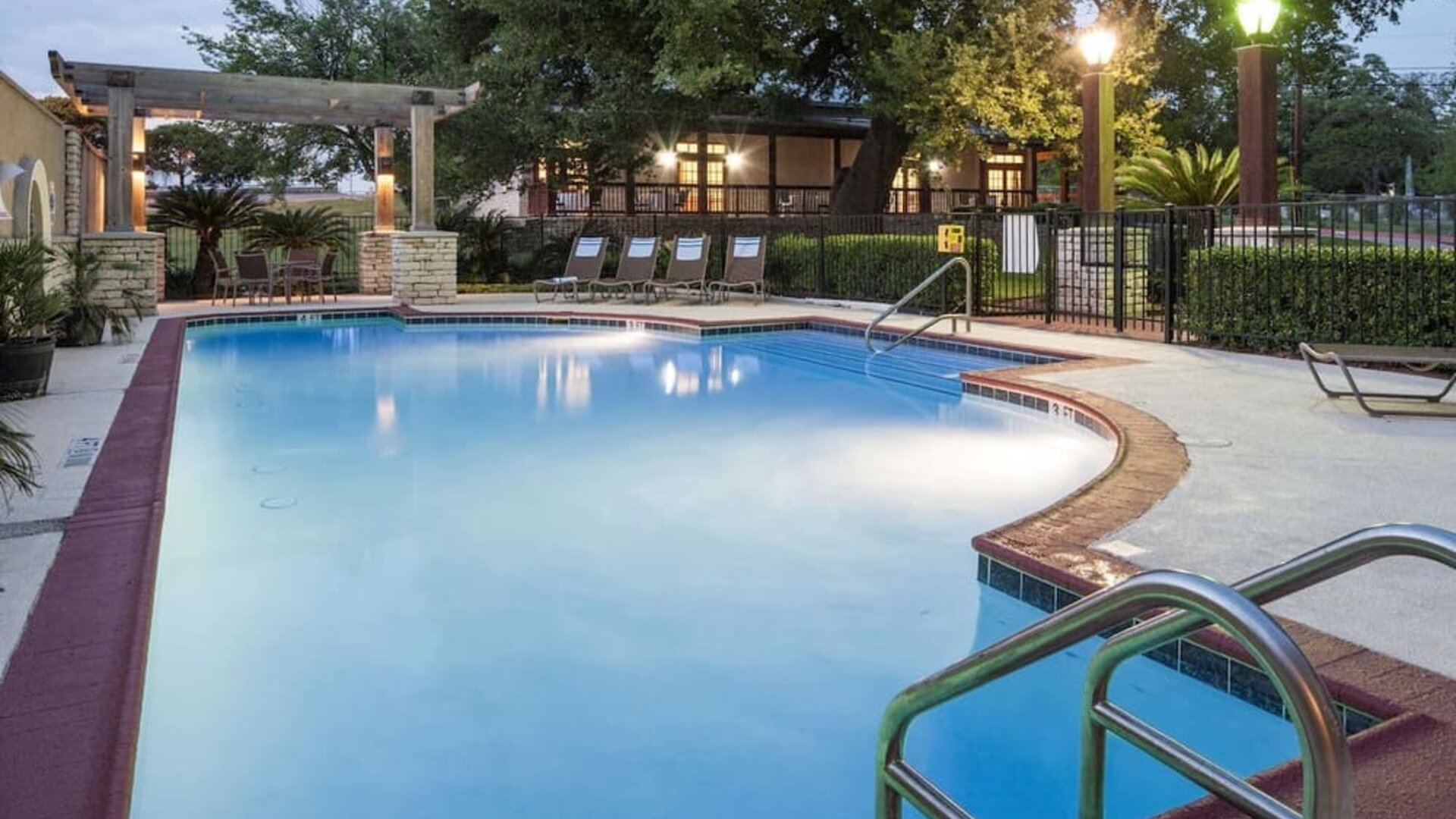 Refreshing outdoor pool at DoubleTree By Hilton Austin University Area.