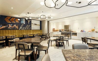 Dining area perfect for coworking at DoubleTree By Hilton Austin University Area.