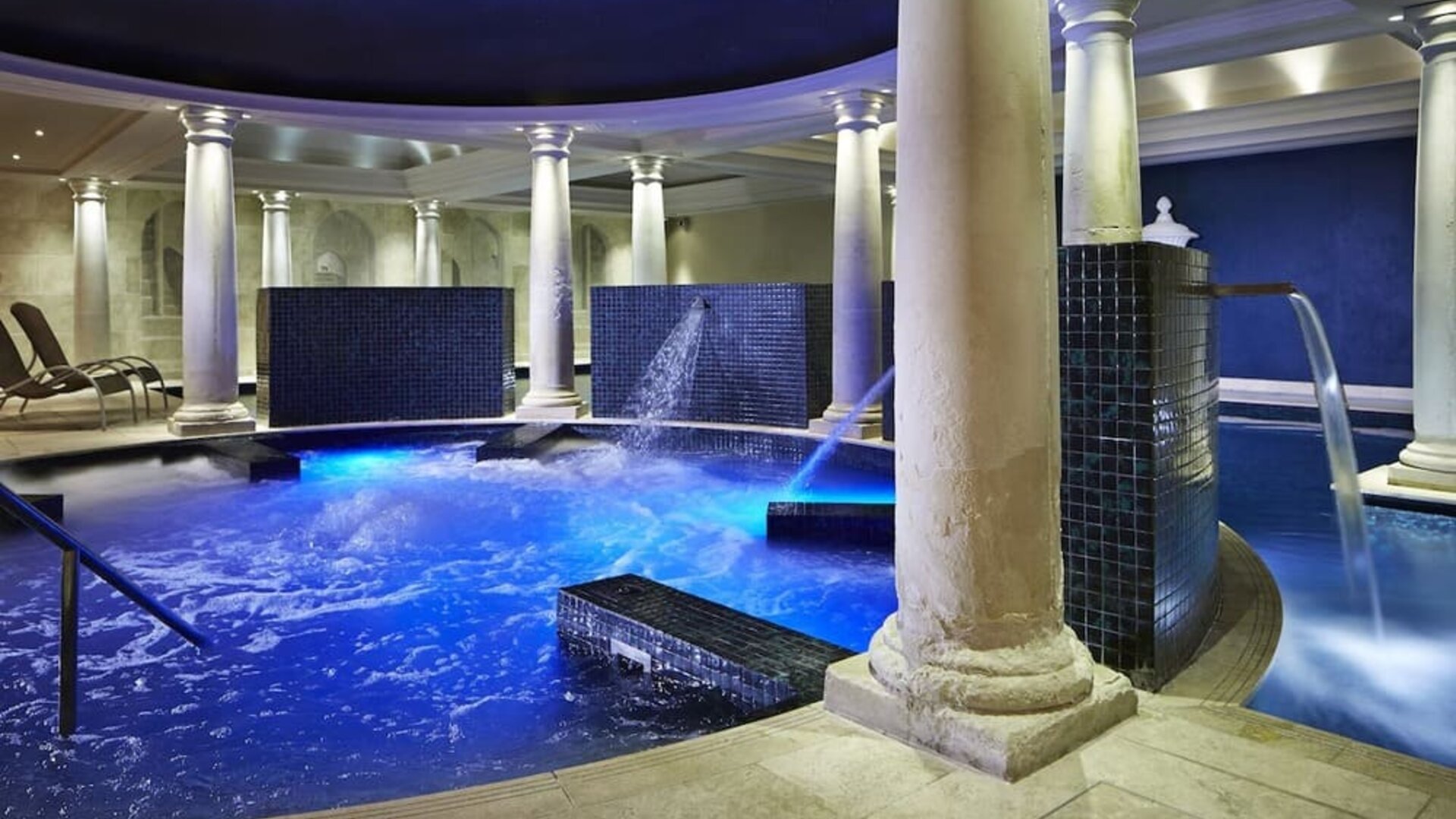 Indoor pool with jacuzzi at Alexander House Hotel And Utopia Spa Hotel.