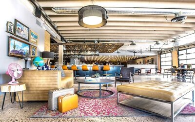 Lobby and coworking lounge at Moxy Phoenix Tempe/ASU Area.