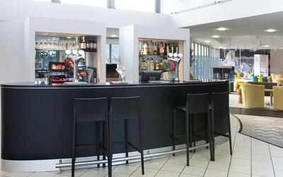 Hotel bar and lounge area at Ibis Styles Haydock.