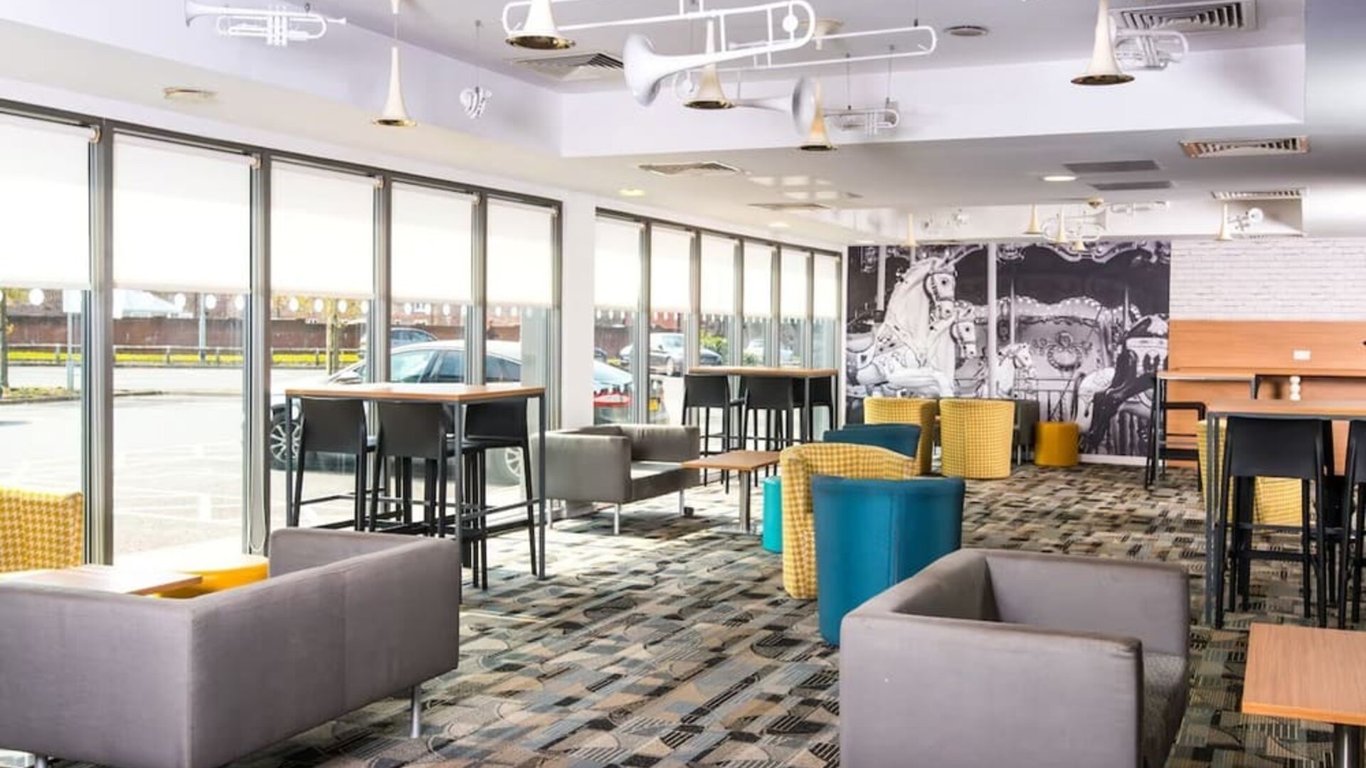 Lobby lounge area at Ibis Styles Haydock.