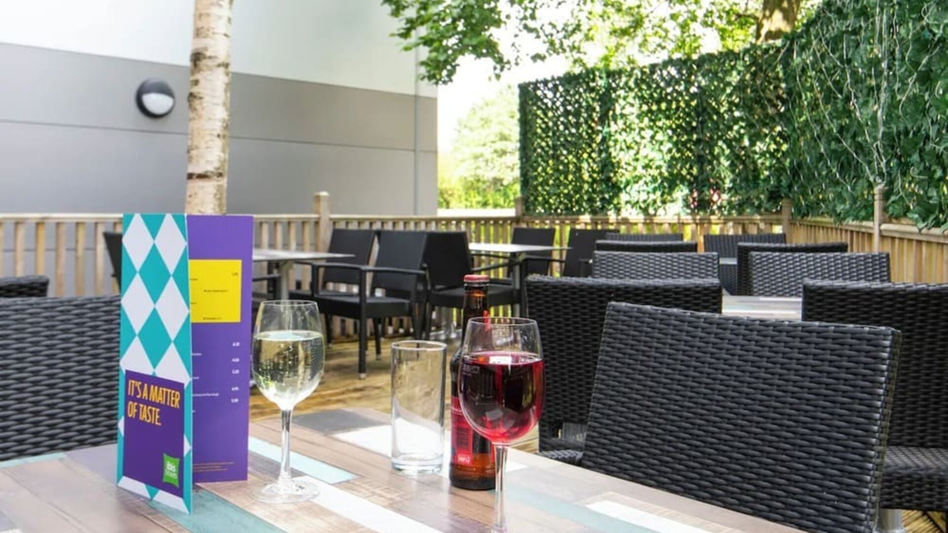 Terrace patio with lounge seating at Ibis Styles Haydock.