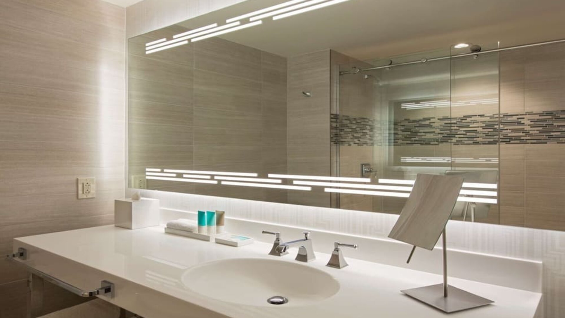 Guest bathroom with shower at Hyatt Regency Dallas.