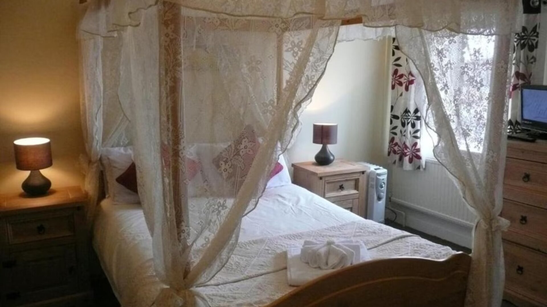 King bed at Rothwell House Hotel.