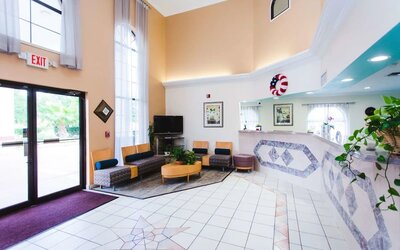 Lobby and coworking lounge at Best Western Pearland Inn.