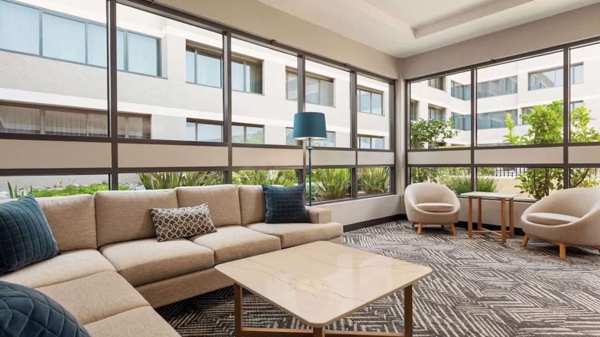 Lobby and coworking lounge at Radisson Hotel Sunnyvale Silicon Valley.