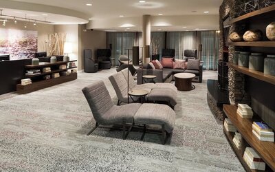 Lobby and coworking lounge at Courtyard By Marriott Hattiesburg.