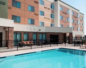 Refreshing outdoor pool at Courtyard By Marriott Houston NASA/Clear Lake.