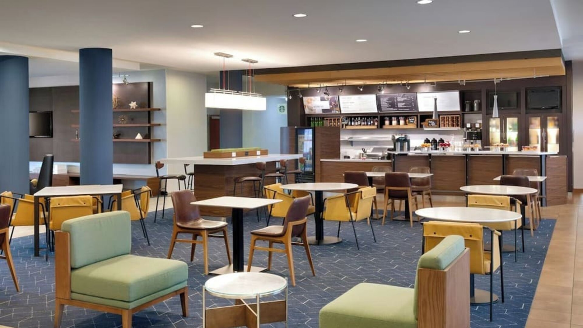 Dining area perfect for coworking at Courtyard By Marriott Houston NASA/Clear Lake.