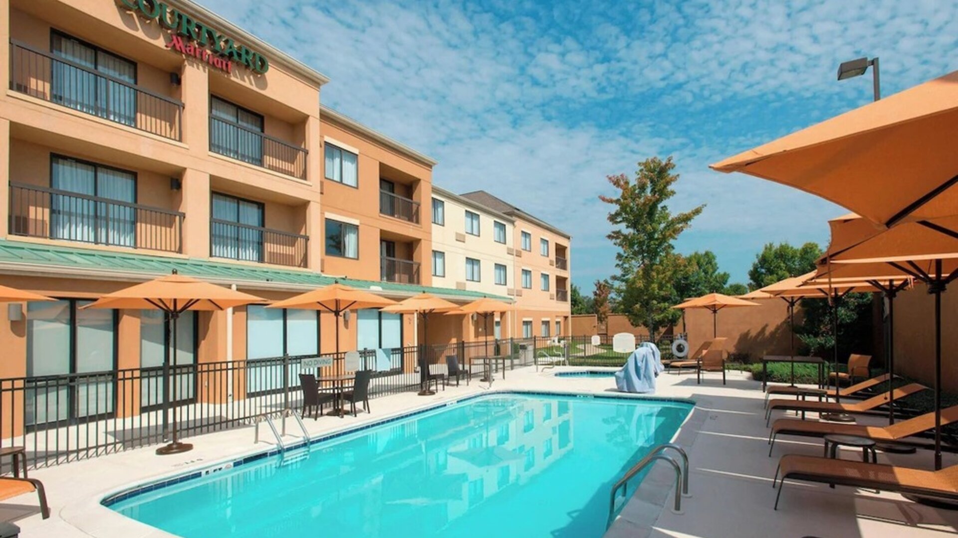 Refreshing outdoor pool at Courtyard By Marriott Montgomery Prattville.