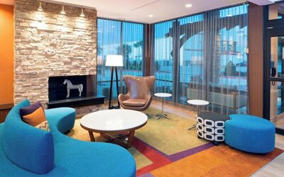 Lobby and coworking lounge at Fairfield Inn & Suites By Marriott Houston Pasadena.