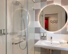 Guest bathroom at Hampton By Hilton Budapest City Centre.