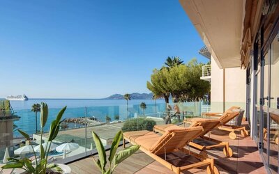 Day room with balcony views at Canopy By Hilton Cannes.