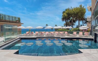 Outdoor pool area at Canopy By Hilton Cannes.
