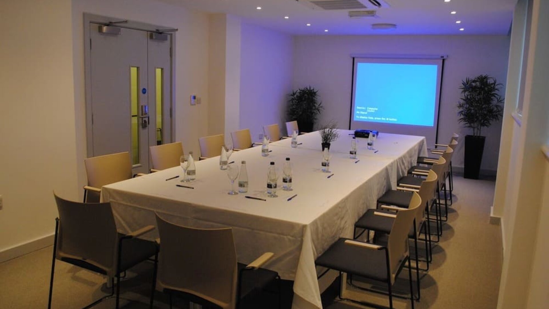 Professional meeting room at Pelican London Residence & Hotel.