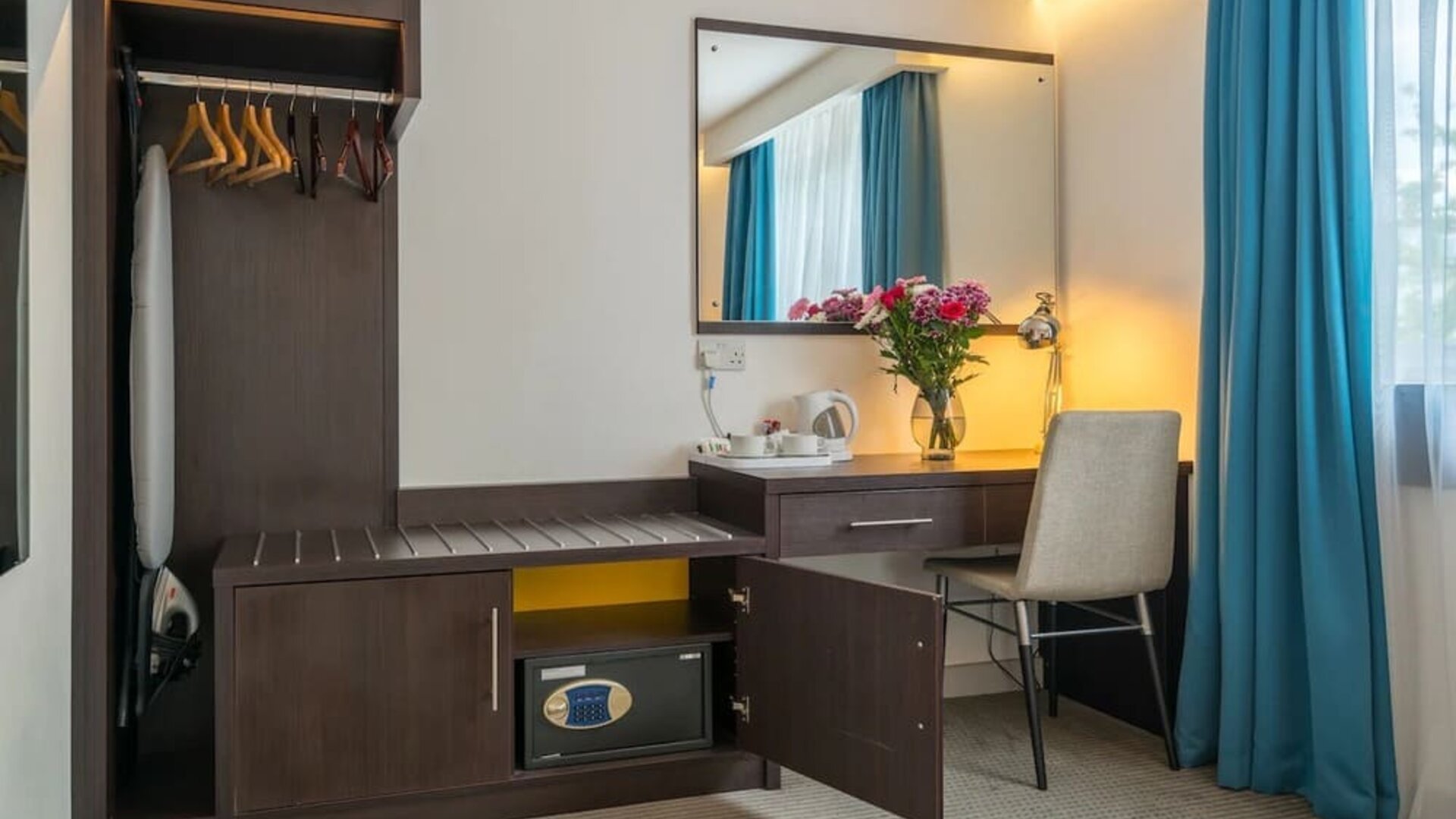 In room workspace at Pelican London Residence & Hotel.