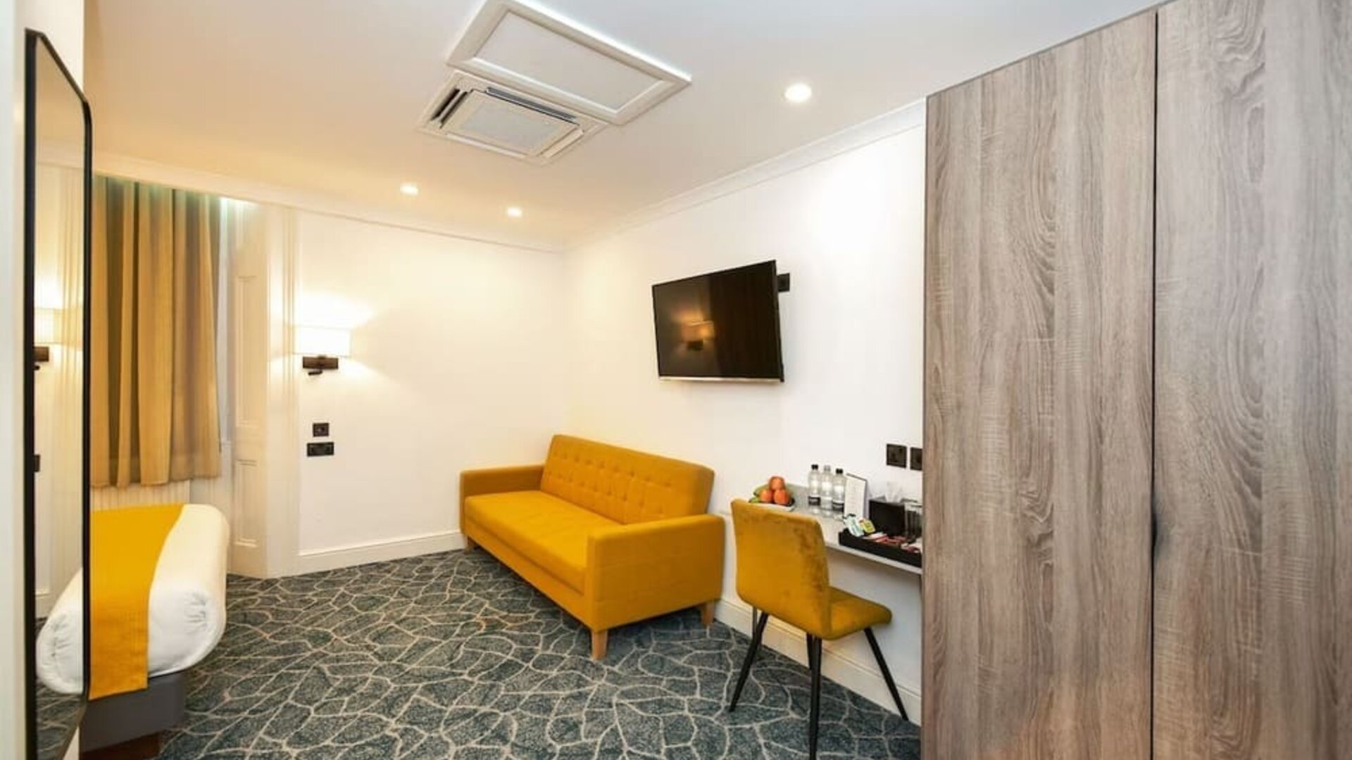 In-room workspace at The Bayswater Inn Hotel.